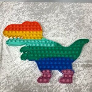 Jumbo Dinosaur Pop It T-Rex multi color rainbow toy